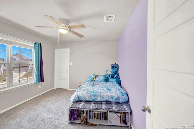 bedroom with visible vents, ceiling fan, baseboards, and carpet floors