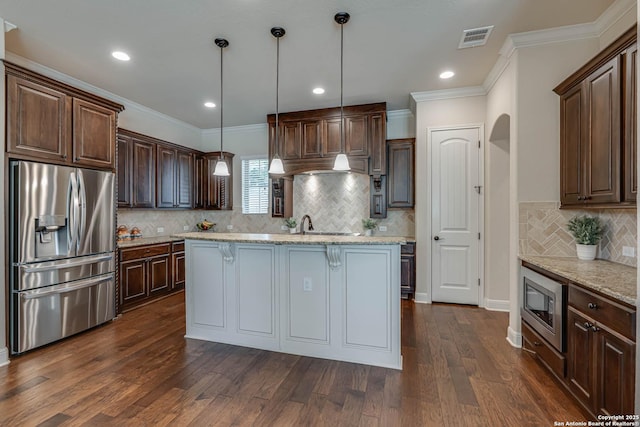 kitchen with visible vents, ornamental molding, dark wood-style floors, appliances with stainless steel finishes, and dark brown cabinets