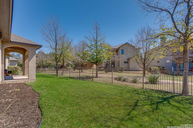 view of yard with fence