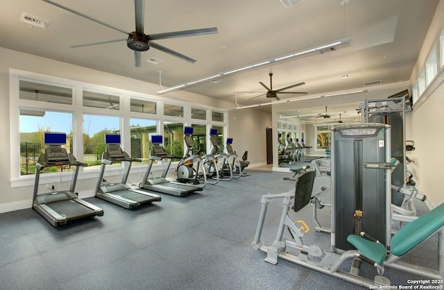 gym featuring visible vents, baseboards, and a ceiling fan