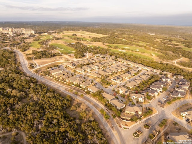 birds eye view of property with a residential view