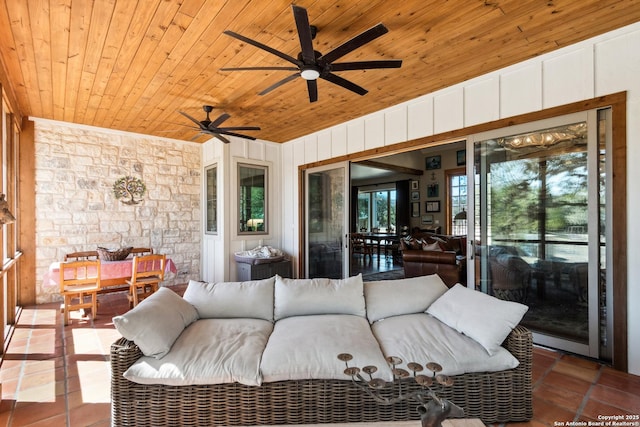 tiled living room with wooden ceiling and a ceiling fan