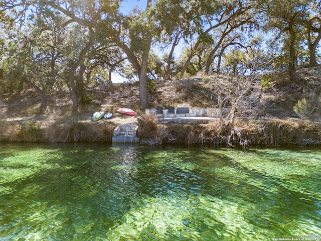 view of yard with a water view