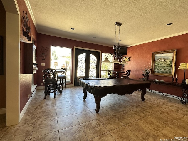 recreation room with crown molding, a textured ceiling, and billiards