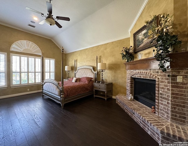 bedroom with visible vents, ornamental molding, hardwood / wood-style flooring, baseboards, and vaulted ceiling