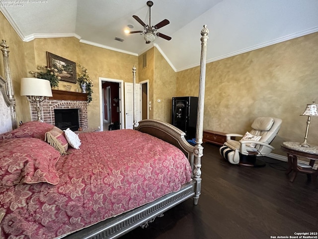 bedroom featuring lofted ceiling, wood finished floors, visible vents, and baseboards