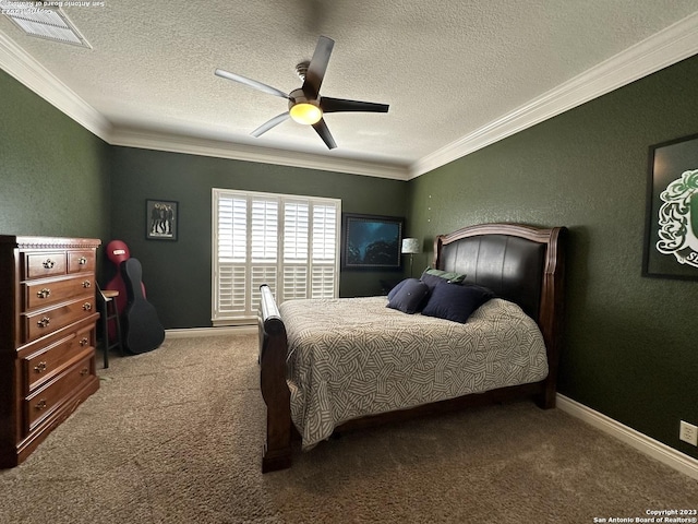 carpeted bedroom with visible vents, crown molding, ceiling fan, a textured wall, and a textured ceiling