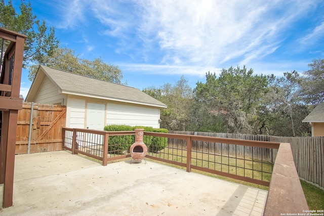 view of patio / terrace featuring fence