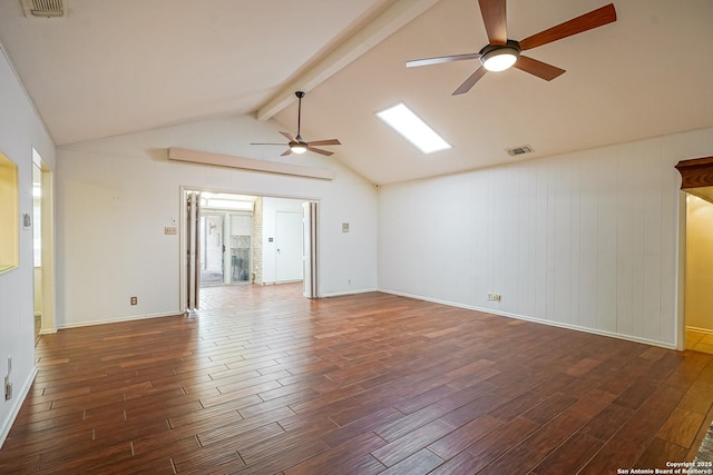 unfurnished room with lofted ceiling with beams, dark wood-style floors, a ceiling fan, and visible vents