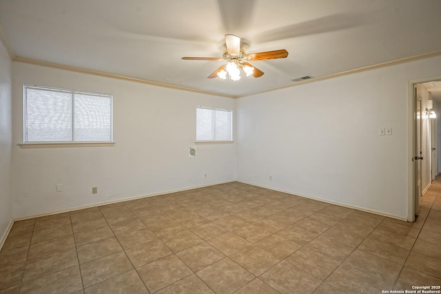 spare room with visible vents, baseboards, crown molding, and ceiling fan