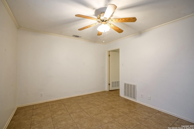 unfurnished room with visible vents, crown molding, and ceiling fan