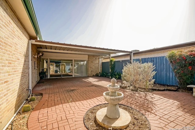 view of patio / terrace with fence