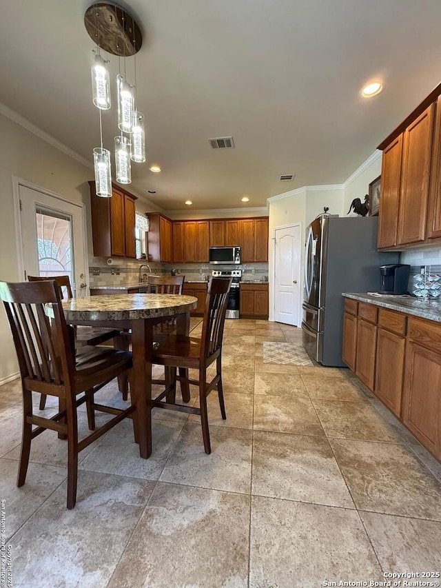 dining room featuring visible vents, recessed lighting, and ornamental molding