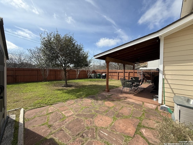 view of yard featuring a fenced backyard and a patio area