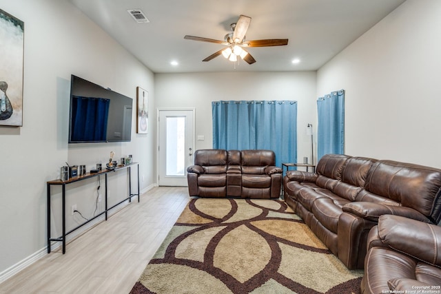 living area featuring visible vents, recessed lighting, a ceiling fan, and light wood-type flooring