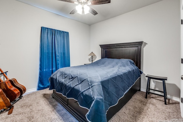 bedroom featuring baseboards, a ceiling fan, and carpet flooring