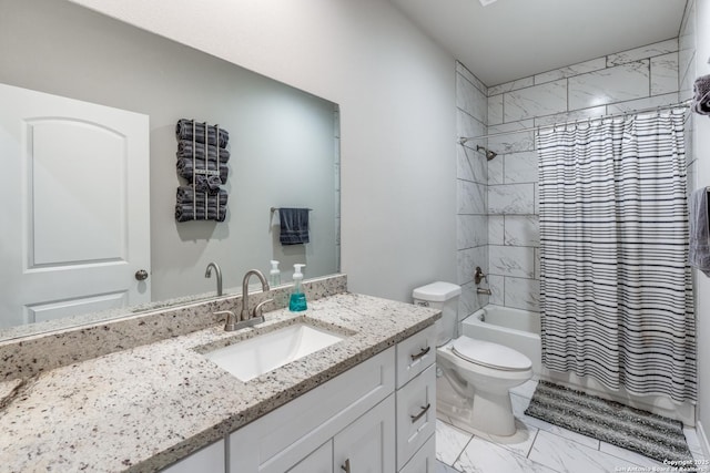 bathroom with vanity, toilet, marble finish floor, and shower / tub combo