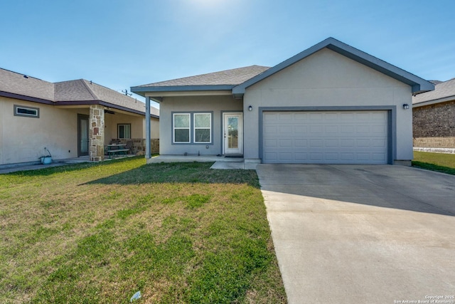 ranch-style home featuring a front lawn, an attached garage, driveway, and stucco siding