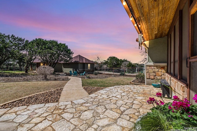 view of patio featuring fence