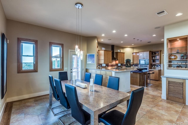 dining area with visible vents, recessed lighting, and baseboards