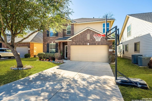 traditional home featuring an attached garage, a front lawn, concrete driveway, central air condition unit, and brick siding