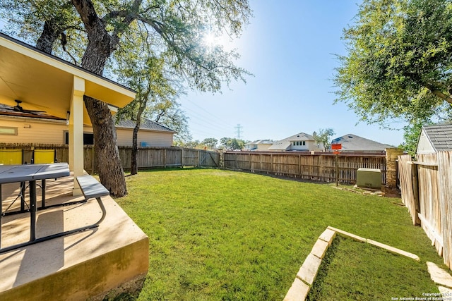 view of yard featuring a fenced backyard and a patio area