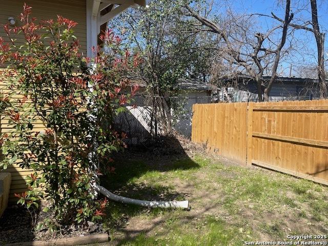 view of yard with fence