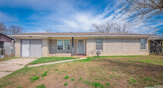 single story home featuring brick siding and a front lawn