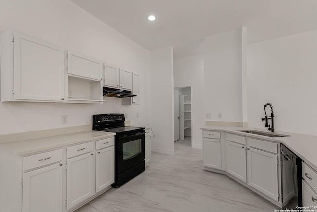 kitchen featuring black appliances, a sink, under cabinet range hood, white cabinetry, and light countertops