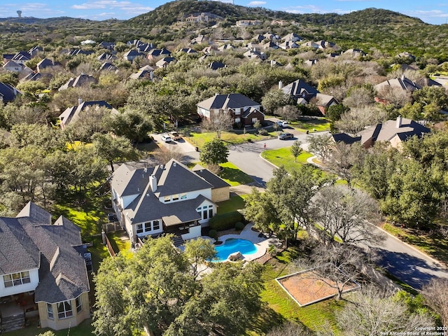 bird's eye view with a mountain view and a residential view