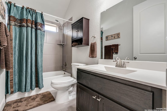 bathroom featuring vanity, toilet, lofted ceiling, and shower / tub combo with curtain