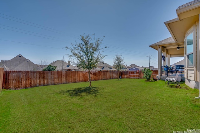 view of yard with a fenced backyard