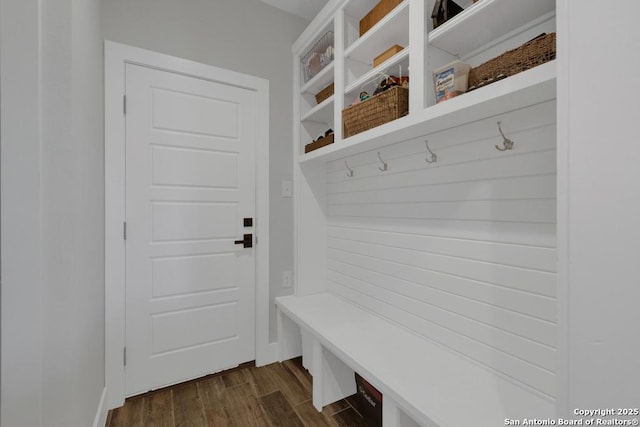 mudroom featuring dark wood finished floors