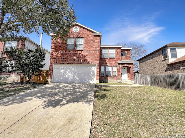 traditional-style house with a front yard, fence, driveway, a garage, and brick siding