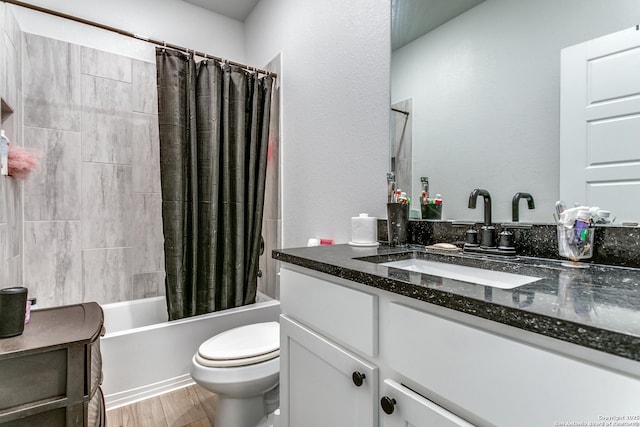 bathroom with shower / tub combo with curtain, toilet, wood finished floors, and vanity