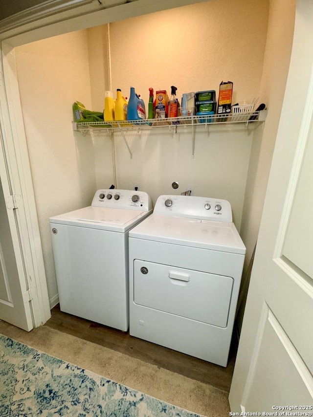 laundry area featuring laundry area and washing machine and dryer