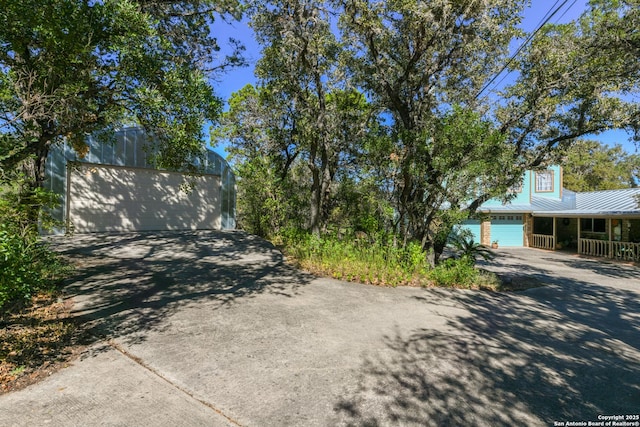 view of road with driveway