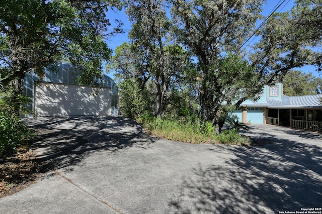 view of street with driveway