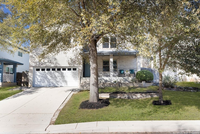 view of property hidden behind natural elements with a front lawn, fence, covered porch, a garage, and driveway