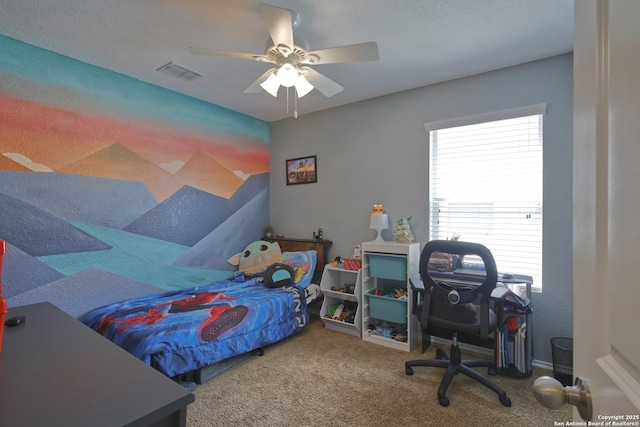 bedroom with visible vents, carpet floors, and ceiling fan