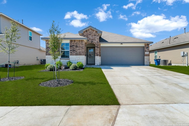 single story home featuring stone siding, central AC, concrete driveway, and a front yard