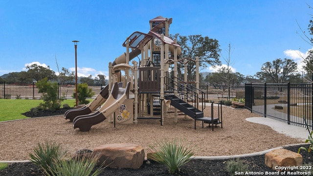 communal playground with fence