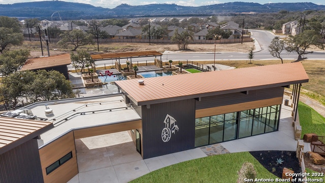 bird's eye view featuring a mountain view and a residential view