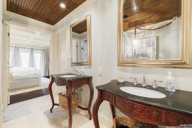 bathroom featuring vanity, coffered ceiling, crown molding, wooden ceiling, and connected bathroom