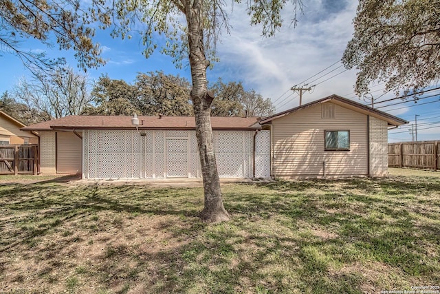 garage with fence