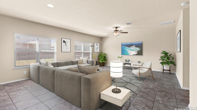 living room featuring baseboards, visible vents, a textured ceiling, and ceiling fan