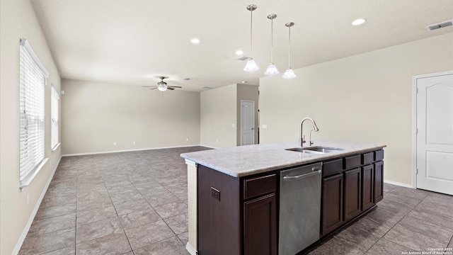 kitchen featuring visible vents, a sink, stainless steel dishwasher, dark brown cabinets, and ceiling fan