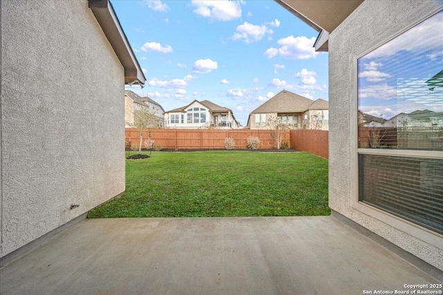 view of yard featuring a fenced backyard and a patio