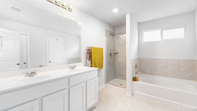 full bath with a bath, visible vents, a shower stall, and a sink