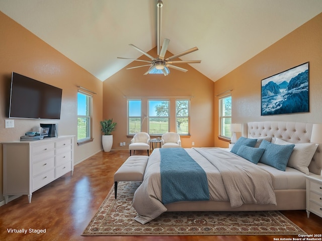 bedroom featuring multiple windows, finished concrete flooring, and high vaulted ceiling